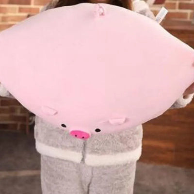 Peluche cochon rose avec un gros groin