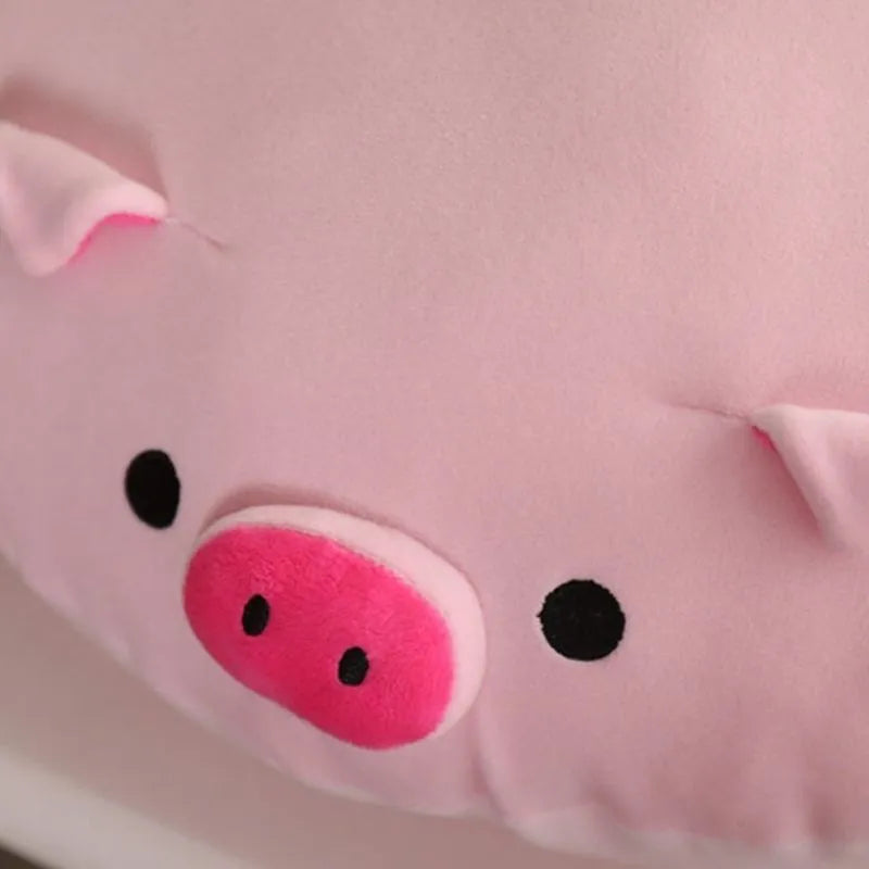 Peluche cochon rose avec un gros groin