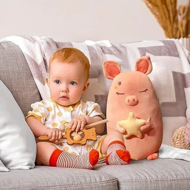 Géante peluche cochon attachant et rempli de tendresse