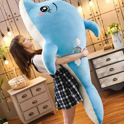 Dauphin peluche bleu aux yeux brillants