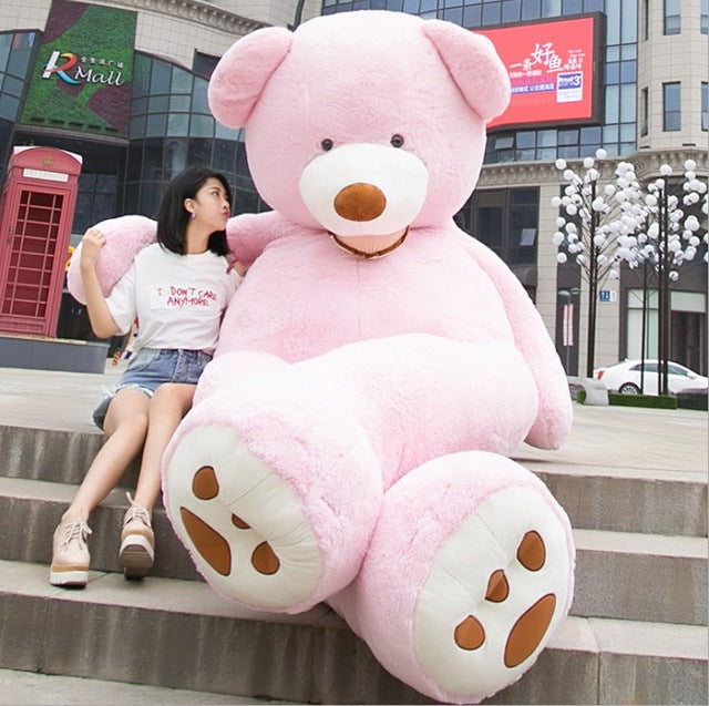 Gros nounours en peluche rose