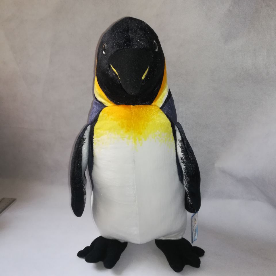 Gros pingouin en peluche pour décorer