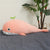 Mascotte peluche géante rose baleine exploratrice