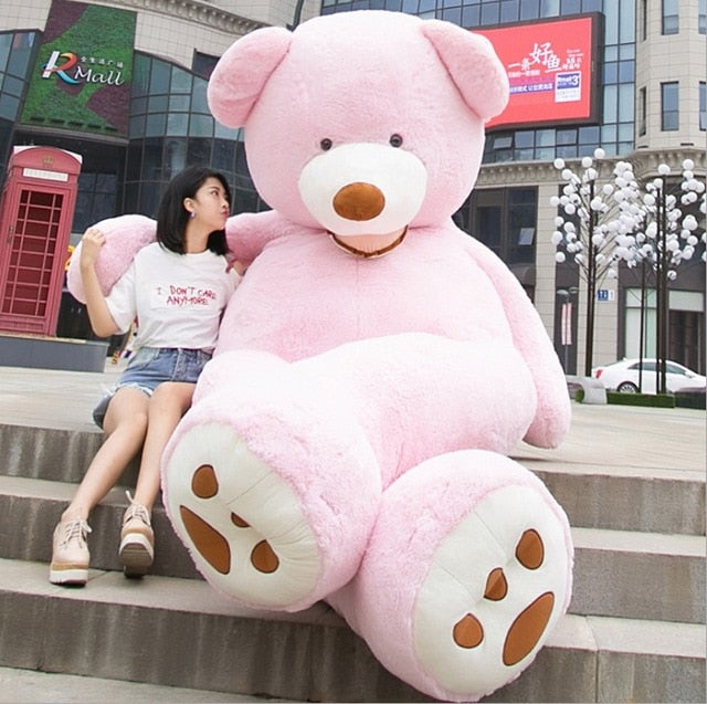 Grand ours en peluche rose à aimer tendrement