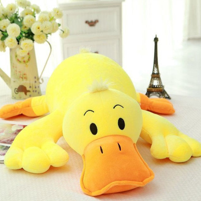 Peluche géante canard aux yeux tous ronds