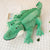 Grosse peluche crocodile sympathique