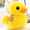 Gros canard en peluche coin coin aux grands yeux