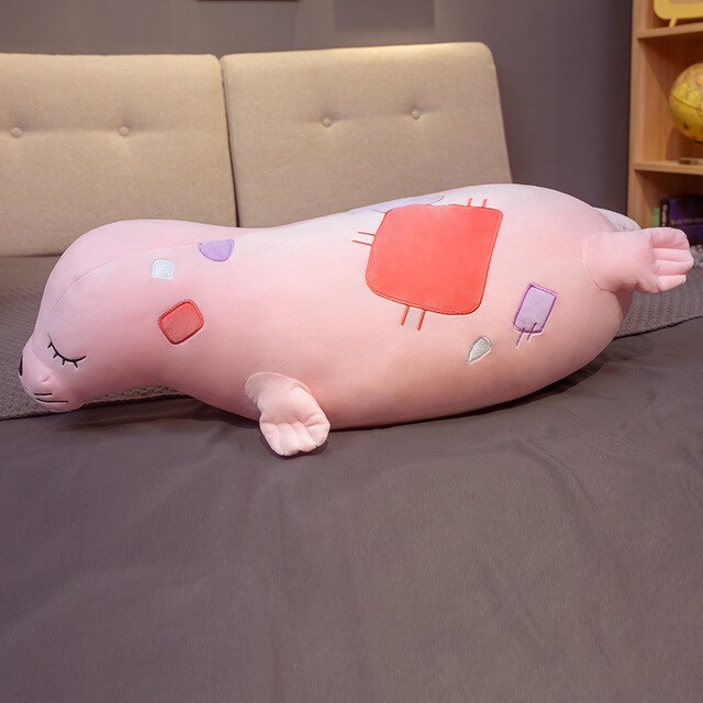 Grosse peluche rose phoque pleine de tendresse